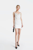 Elegant Ava White Satin Backless Slip Dress featuring a straight cut and crossed straps.