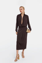 Brown Carol Wrap Dress with draped skirt and V-neckline.