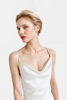 Stylish White Slip Dress with an open back, perfect for any occasion.