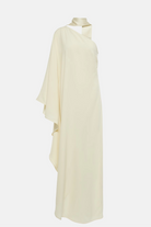 Sophisticated cream gown featuring an asymmetrical neckline and a chic bow detail.