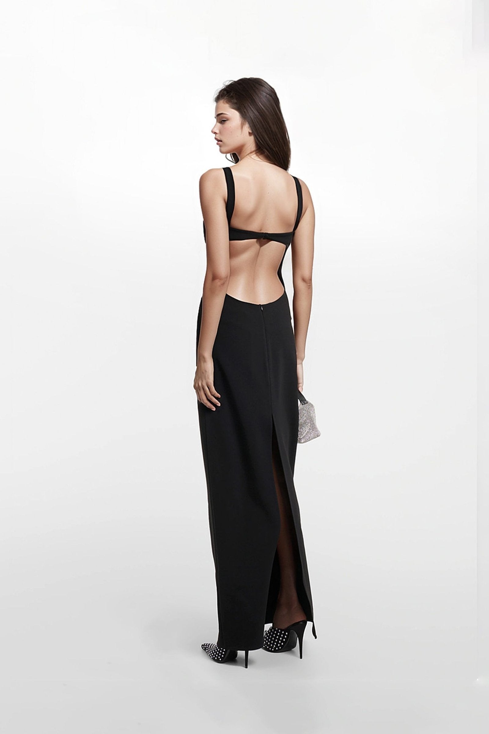 Designer black maxi dress crafted from polyester crepe for a luxurious feel.