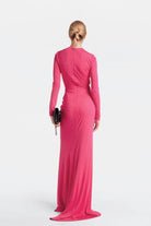 Graceful long dress designed in Madrid with enveloping draping for a perfect fit.