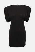 Black ruched jersey mini dress with elegant silhouette.