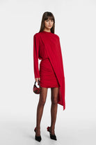 Iris Caped Jersey Minidress in red with a chic draped skirt and elegant cape.