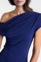 Sophisticated one-shoulder dress made from soft jersey, showcasing elegance and style.