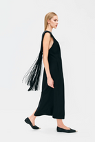 Stylish fringed dress designed for women, perfect for evening events and special occasions.