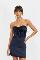 Elegant navy satin mini dress with a flattering A-line silhouette and tie-front design.