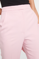 High-rise Sheila Pink Pants with flared fit and vertical seams.