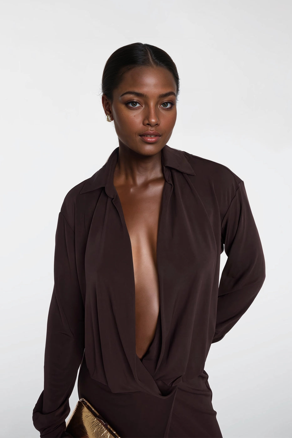 Sophisticated V-neck brown dress with wrap silhouette.