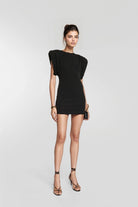 Statement-shouldered ruched mini dress in sleek black.