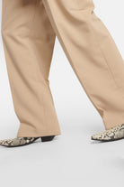 Pleated straight pants in beige, crafted from high-quality polyester crepe fabric.