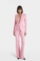 Julie Single-Breasted Crepe Blazer in pink with oversized shoulders and cinched waist.