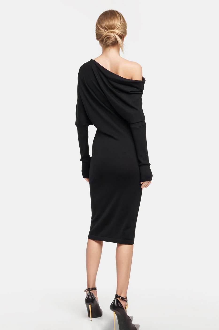 Stylish fitted black rib midi dress designed for warmth and elegance on fresh days.