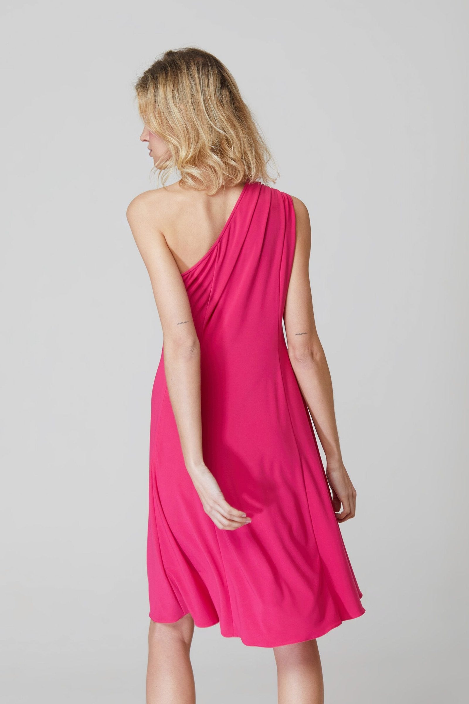 Stylish fuchsia dress designed for a bold, confident look.