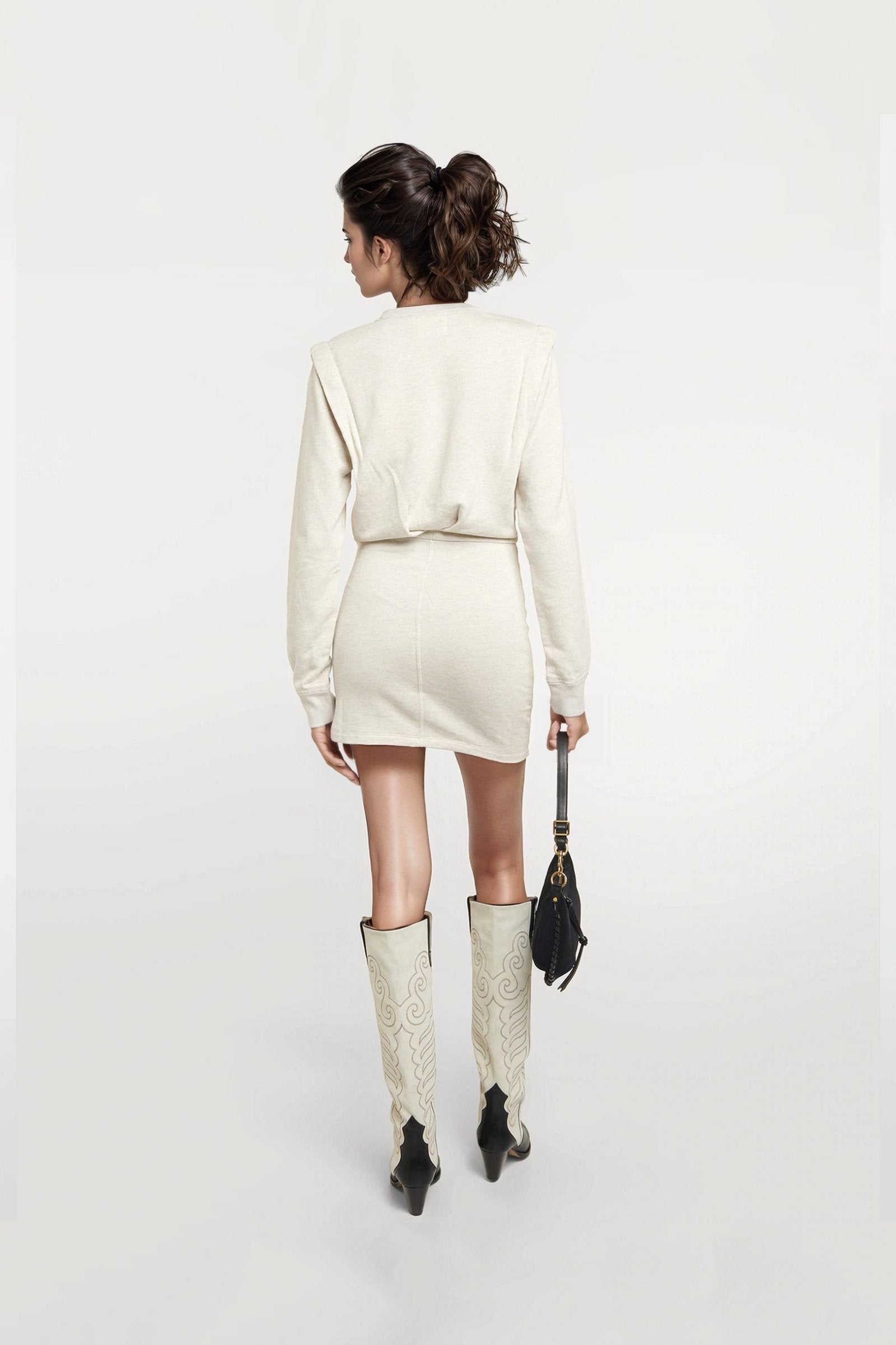 Sustainable fashion: Ruched beige mini dress with long sleeves.