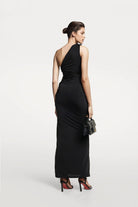 Designer long black dress, proudly made in Madrid with a bold cutout.