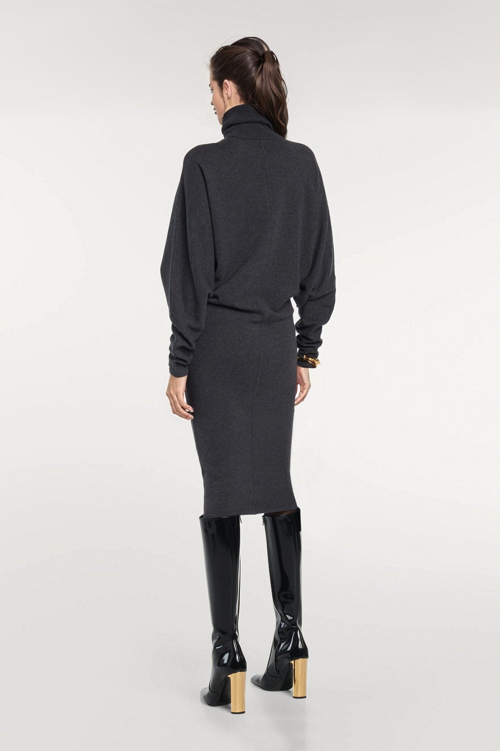 Sophisticated turtleneck dress with Japanese sleeves.