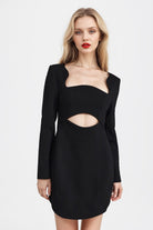 Elegant black dress featuring a stylish cut-out design