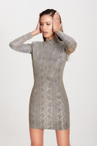 Elegant grey minidress featuring a crew neckline and long sleeves.