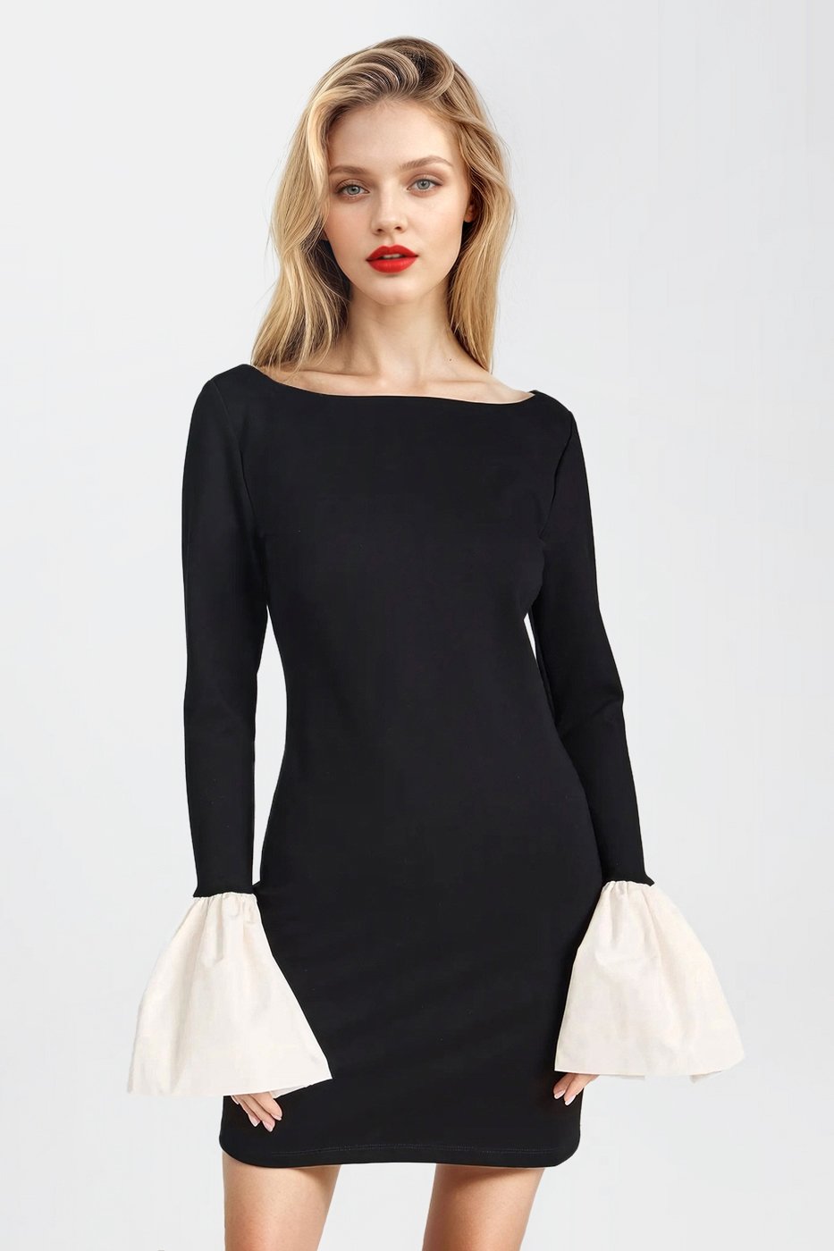 Sleek black cocktail dress with taffeta accents, perfect for special occasions