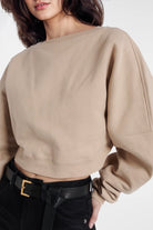 Comfortable boat neck fleece top perfect for casual wear.