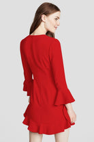 Stylish women's red dress featuring playful ruffles.