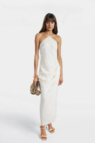 Liss Halterneck Linen Maxi Dress in off-white with drawstring detail.